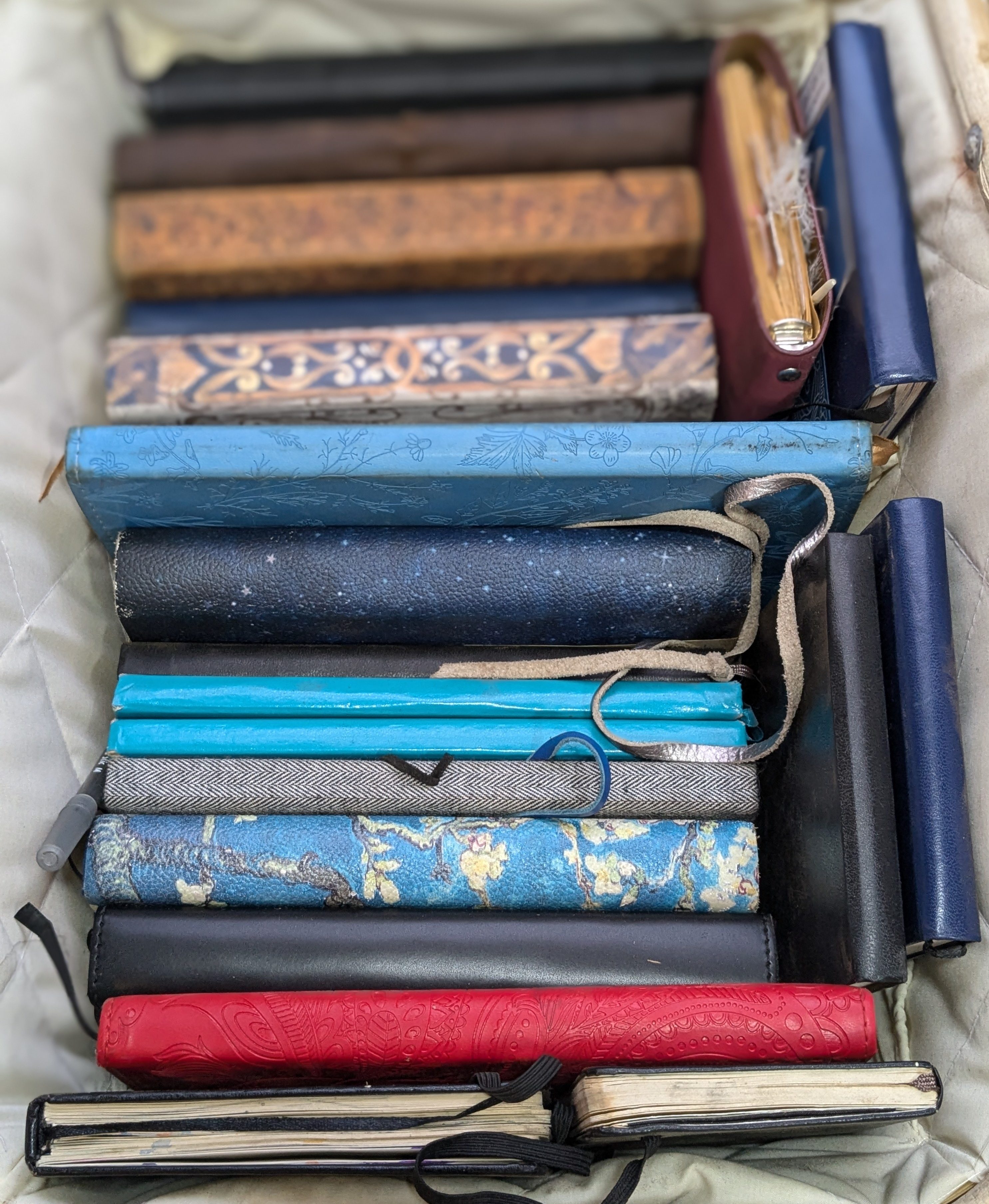 A basket full of journals.
